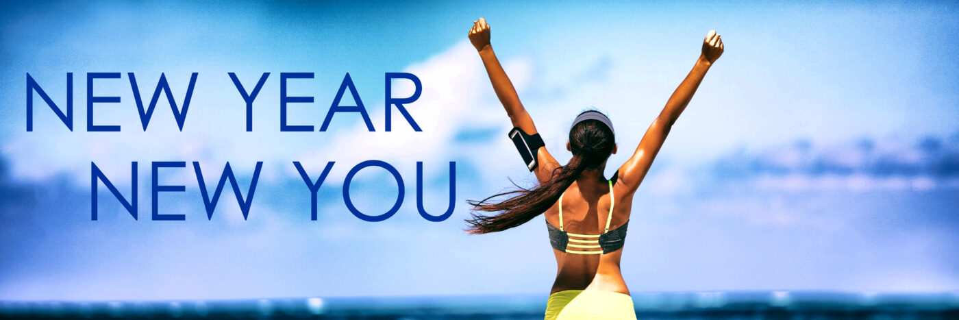 Woman with arms raised facing the sea under a sky with "new year new you" text overlay.