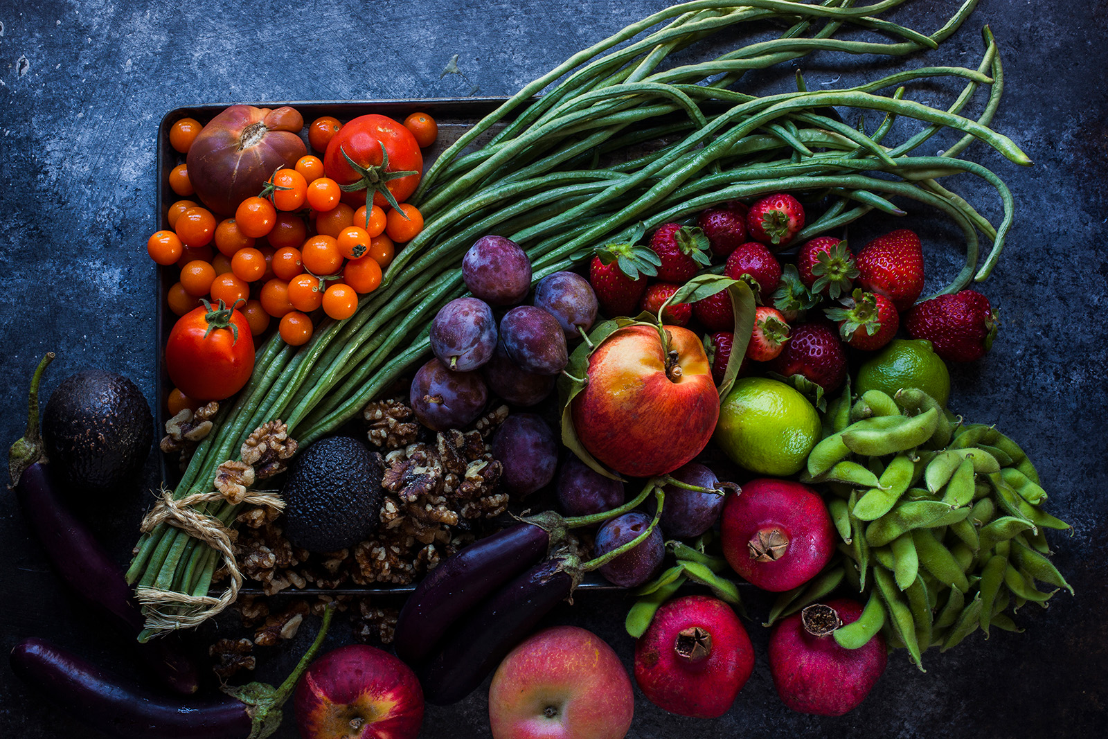 tray full of colorful fruits and vegetables